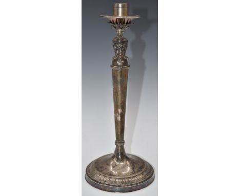 White metal figural candlestick with leaf decoration to base, marks indistinct but marked to base and three pieces of top, he