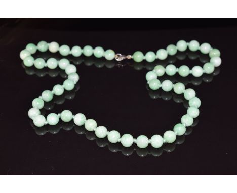A necklace of jade beads, 67.8g, 56cm long&nbsp;