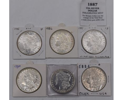 Six USA Morgan silver Dollars comprising 1884, 1885, 1886, 1887, 1890 and 1900 examples