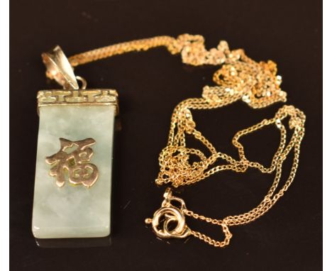 A 9ct gold pendant set with jade and Chinese character on 9ct gold chain, 2.3g&nbsp;