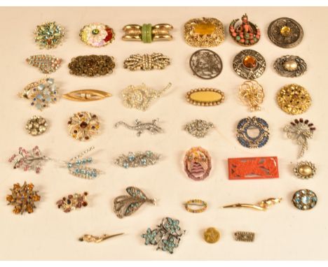 A collection of brooches, two Burmese comprising one&nbsp;silver and one coral and turquoise, gold layered button brooch, etc