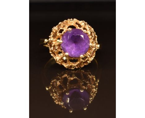 A 14k gold ring set with paste in pierced design, 3.9g, size K