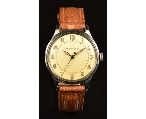 Jaeger LeCoultre gentleman's wristwatch with luminous blued hands, Arabic numerals, champagne dial, stainless steel case and 