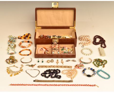 A collection of jewellery, some silver including earrings, bangle and fob, amber bracelet and necklaces including amber, amet