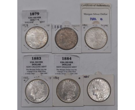 Six USA Morgan silver Dollars comprising 1879 Philadelphia, near uncirculated, 1881, 1882, 1883 and 1884, near uncirculated a