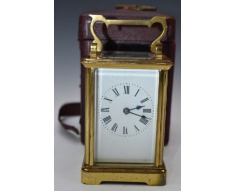 Brass cased carriage clock striking on a gong, in original travelling case, overall height 15cm