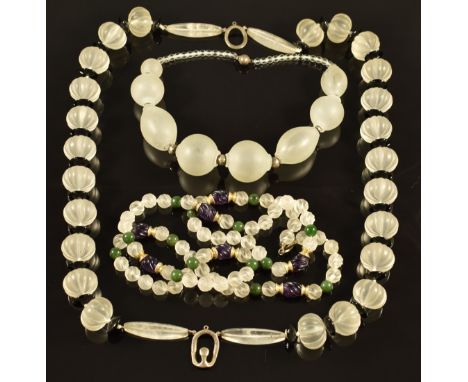 Two beaded necklaces, one made up of carved rock crystal and onyx, the other carved rock crystal, amethyst and nephrite jade 