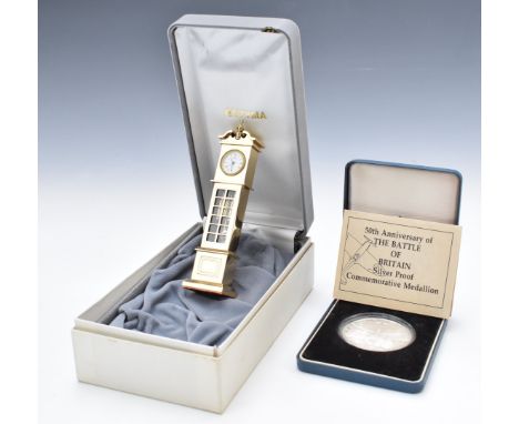 Royal Mint Battle of Britain silver proof&nbsp;medallion, weight 50g, and a miniature Estyma longcase clock, in original box 