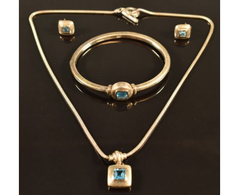 A suite of silver Links of London jewellery set with blue topaz comprising earrings, necklace and bangle