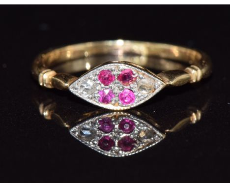 An 18ct gold ring set with rubies and rose cut diamonds,1.5g, size K