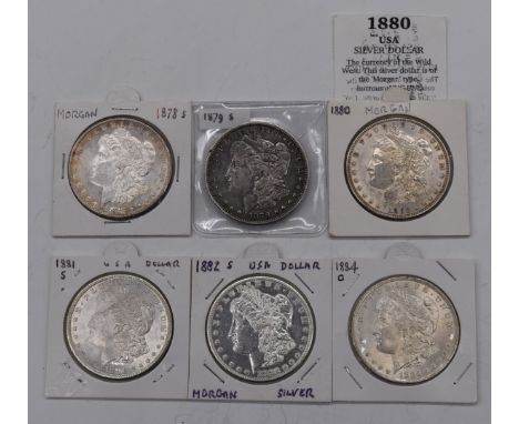 Six USA Morgan silver Dollars comprising 1878 and 1879 San Francisco, 1880, 1880, 1882 and 1884 New Orleans examples