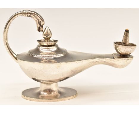 Egyptian silver novelty tabletop lighter formed as an ancient oil lamp, length 12cm, weight 95g all in