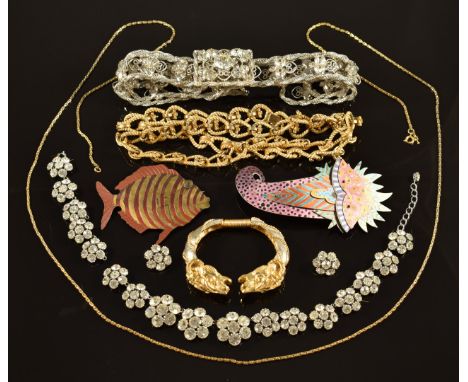 A collection of costume jewellery including a belt set with diamanté in Ken Lane box, diamanté necklace, Trifari chain, ram h