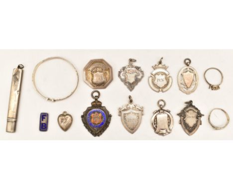 Hallmarked silver items comprising pair of napkin rings, buckle bangle, pot lid and a tennis interest teaspoon, weight 105g