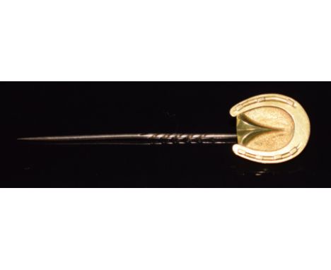 Victorian yellow metal stick pin in the form of a horseshoe verso a locket compartment, 4.8g, 8cm long