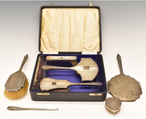 Cased hallmarked silver dressing table set, further hallmarked silver hand mirror and brush, hallmarked silver handled button