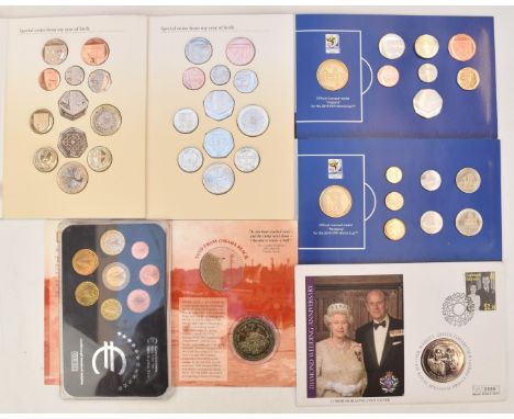 A collection of various coin presentation packs to include Royal Mint&nbsp;'My First Coins', 2010 FIFA World Cup, D-Day, Euro