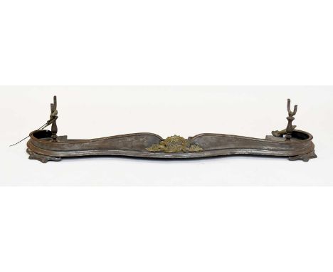A 19th Century Steel Serpentine Fire Fender, with brass mounts, 150cm