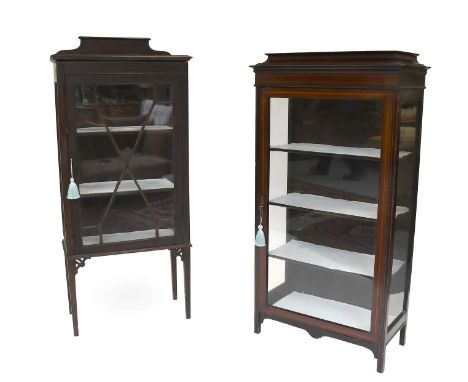 Two Edwardian Mahogany Display Cabinets, one with caddy-form top, 67cm by 33cm by 127cm, the other on slender tapering square