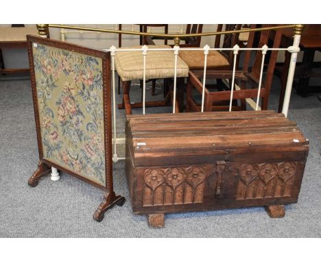 A 19th Century Spruce Chest with Gothic Tracery, 86cm by 47cm by 46cm, together with an early-20th century oak-framed needlew