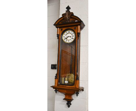 A Vienna Type Double Weight Driven Striking Wall Clock, walnut veneererd case with ebonized mouldings, enamel dial with Roman