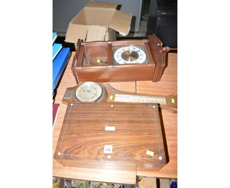 A 19th Century writing slope (minus its interior); a barometer in oak mount; and a reproduction wall clock.