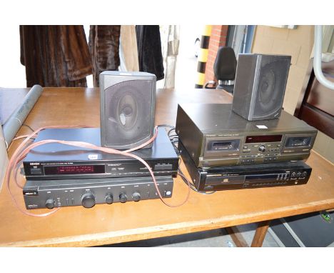A hi-fi system, comprising: a Technics cassette deck; a Morantz compact disc player; a Denon stereo tuner; an Arcam Alpha 5 a