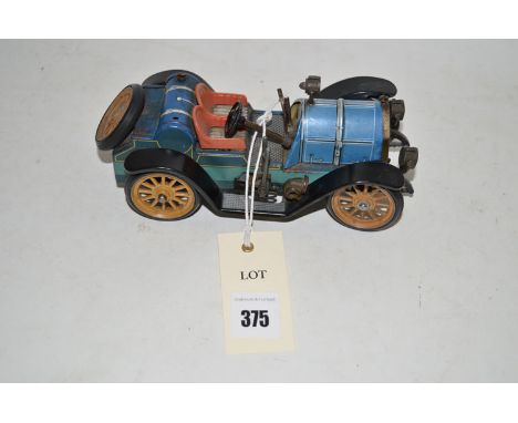 A Schuco Mercer model 1225 "Old Timer" clockwork powered tinplate model motor car (slightly incomplete, no key and no box).