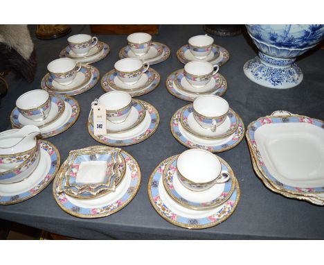 An Aynsley part afternoon tea set for twelve place settings (missing one cup); together with a milk jug; slop bowl; two cake 