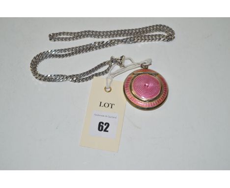 A silver and engine turned pink enamel compact; together with a silver curb link necklace.