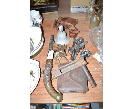 An antique pistol converted to percussion (poor condition); a bundle of keys; a bird scarer; a dashboard clock; a gardener's 