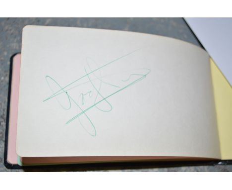 An autograph album containing signatures of Formula One racers, including: Graham Hill, James Hunt and Niki Lauda, c.1970's.