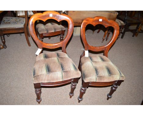 A Georgian mahogany D-end dining table, fitted a single leaf, raised on square reeded legs terminating in ceramic castors.