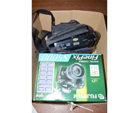 A digital camera; and an Olympus AZ1 zoom camera.  (2)