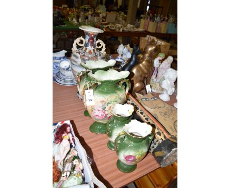 A large Japanese vase with flared rim and two ornate handles decorated typical landscape scenes; and four Victorian moulded w