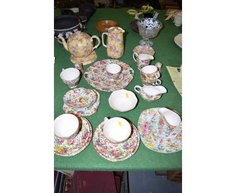 A quantity of Royal Winton 'Summertime' tea china; together with a Royal Winton 'Welbeck' teapot stand and jug.