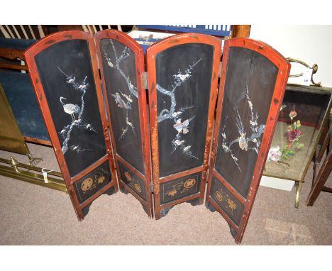 A Japanese four-fold lacquered screen with mother-of-pearl and hand-painted decoration.