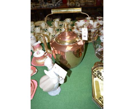 A large copper and brass kettle; and a Nao figure of a young girl.