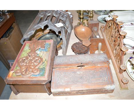 A carved oak corner wall bracket in Gothic style; a convex mirror; various carved wooden ornaments and boxes.