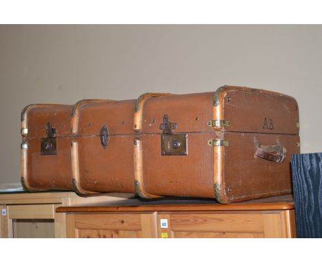 An old trunk with metal and wooden bindings.