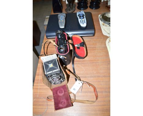 A Voigtlander Superb camera in leather case; a pair of Russian 8 x 30 binoculars; and a Sky Box.