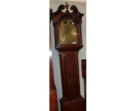 An oak eight-day long case clock, the arched brass dial signed Lawrie, Carlisle, circa 1780, the dial arch with rolling moon 