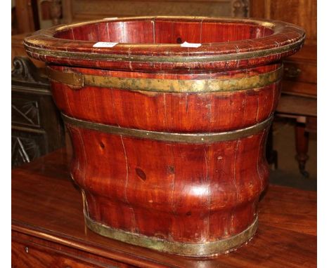 Decorative staved planter with brass bindings 