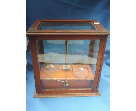 A vintage brass laboratory scale by The British Drug Houses Ltd, London, in case