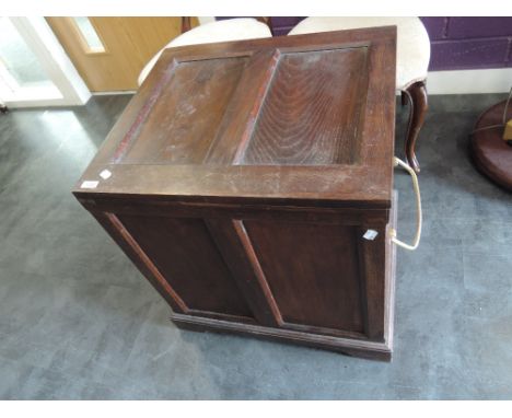An early 20th century oak box of panel form having brass ecclesiastical handles
