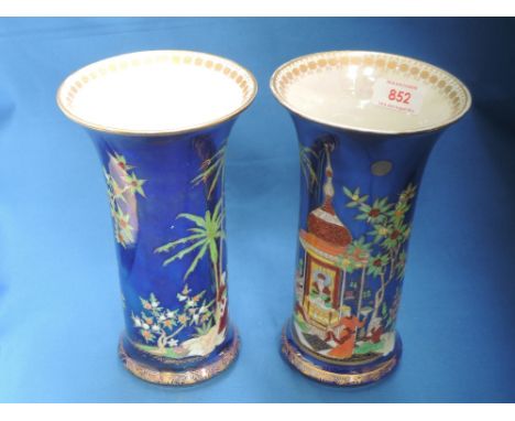 A pair of early 20th century W&R Carltonware slender vases having blue lustre decoration in the Persian pattern