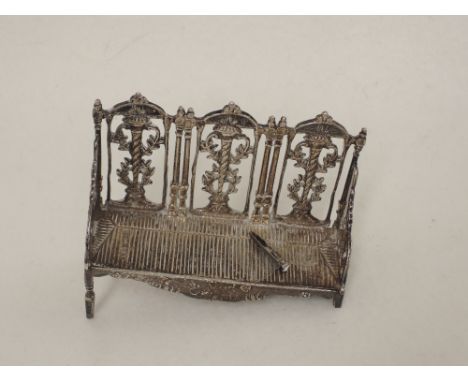 A miniature silver Edwardian style salon sofa, London 1891 Edwin Thompson Bryant, bearing import marks  (AF)