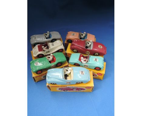 Seven Dinky die-casts, Sunbeam Alpine Sports 107, in light blue spot box, Sunbeam Alpine Sports 107, in pink spot box, MG Mid