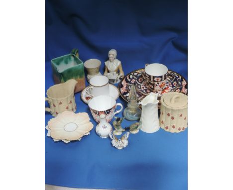 A selection of ceramics including Royal Crown Derby tea ware, pin head doll, 19th century Derby plate, Royal Worcester cabine