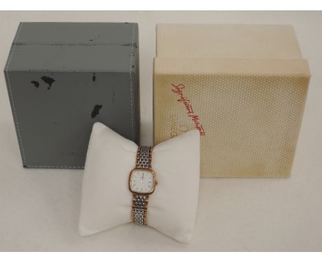 A ladies 1980's Omega De Ville quartz wrist watch having Roman numeral dial to square face on a bi-metal brick effect strap, 